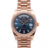 Rolex Day-Date 36 128235-0085 Everose-Gold mit blauem Baguette-Diamant-Zifferblatt