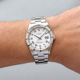 Rolex Oyster Perpetual Date 15210 (1996) – 34 mm, Edelstahl, Weißes römisches Zifferblatt