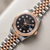 Rolex Lady-Datejust 26 Ref. 179171 (2009) – Stahl/Roségold, schwarzes Diamant-Zifferblatt