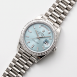 Rolex Day-Date 40, Platinum, Diamonds, Ref. 228396TBR, partially glued, B+P